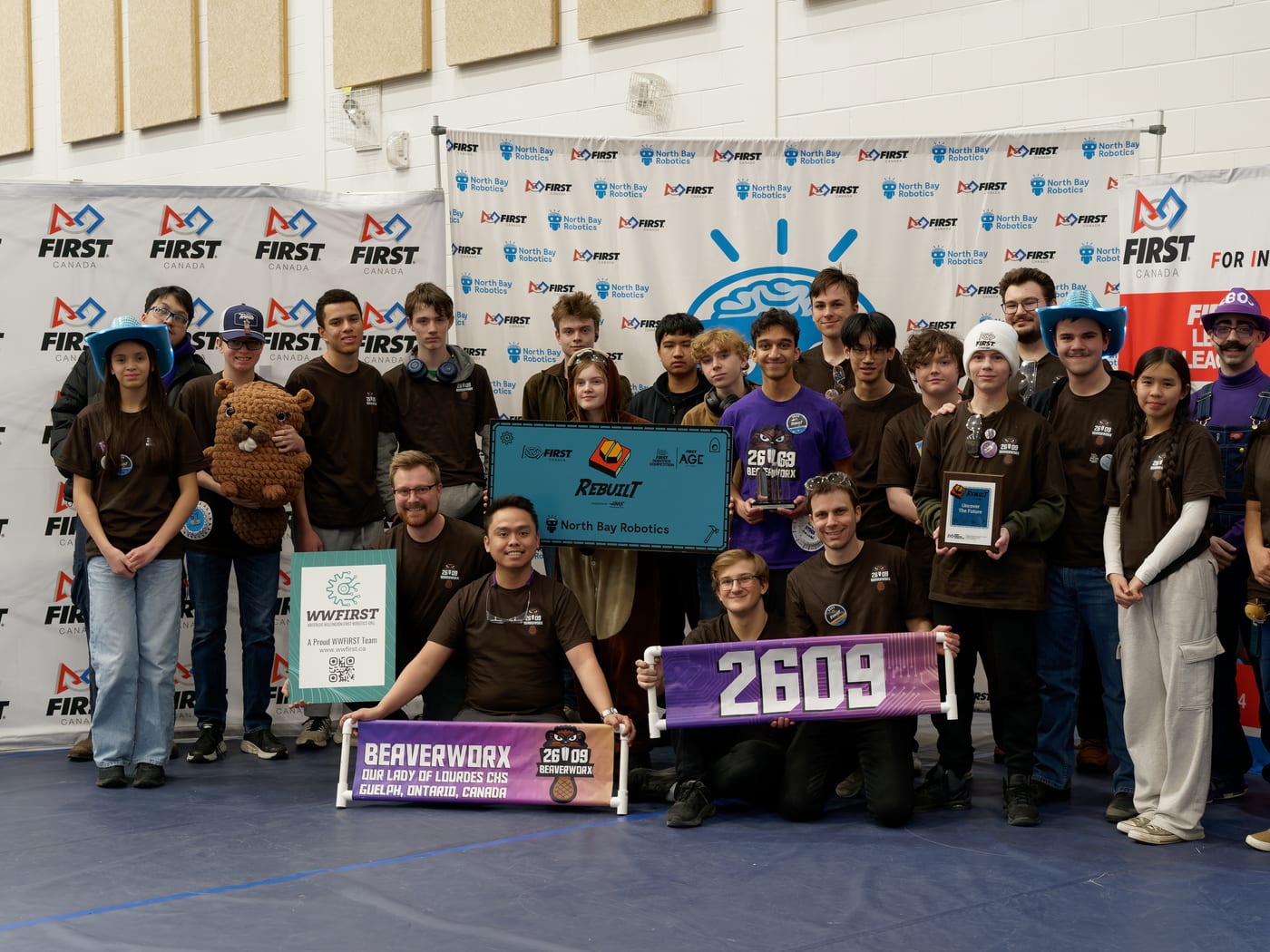 Team 2609 Beaverworx group photo at a FIRST Robotics Competition event