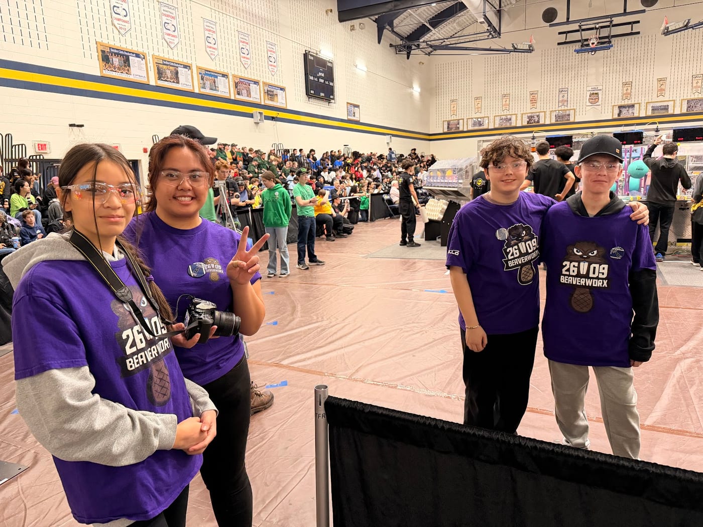 Team 2609 Beaverworx members at a competition venue