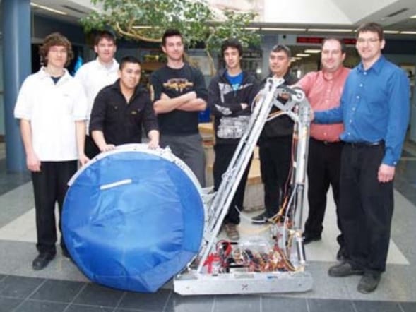 Team 2609 Beaverworx with an early robot